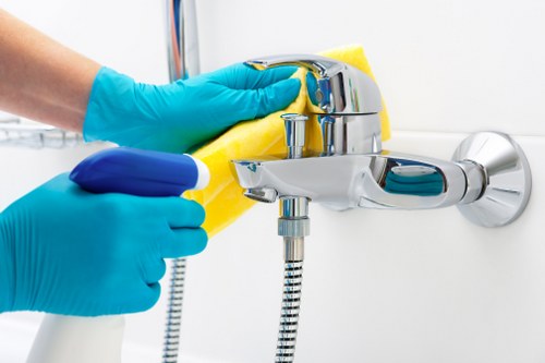 Local cleaning team working in a Greenwich apartment building with access challenges