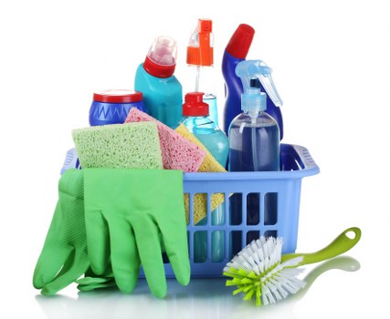 Cleaner working in a Greenwich kitchen and bathroom